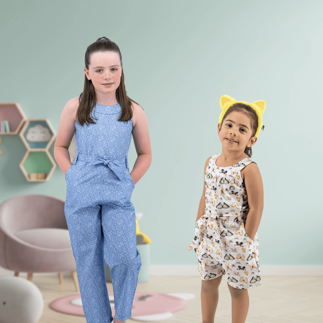 Two girls posing for a picture.